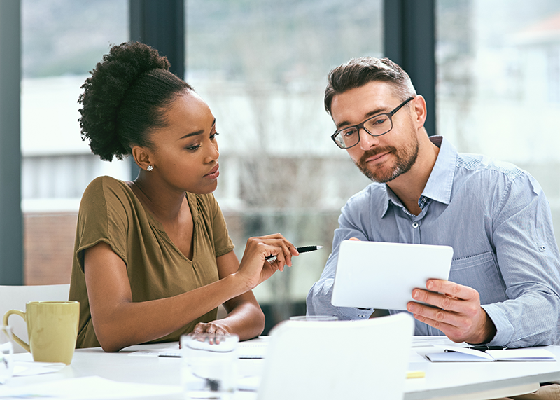 Picture of people engaging using technology tools.